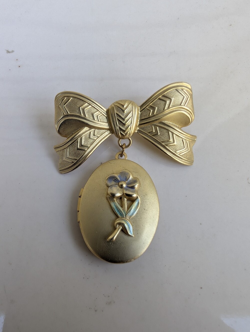 Gold Bow Locket Pin with Floral Accent